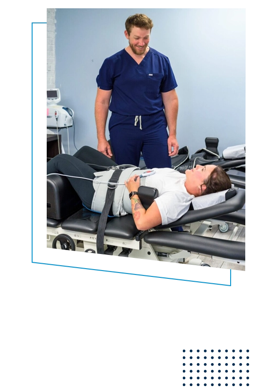 Adam Roussel With a Spinal Decompression Patient